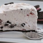 strawberry icebox pie on white plate