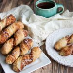 cinnamon twists on table with coffee