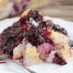 scoop of blackberry bread pudding