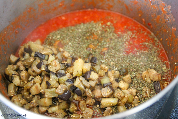 add eggplant and spices to cooked bolognese sauce