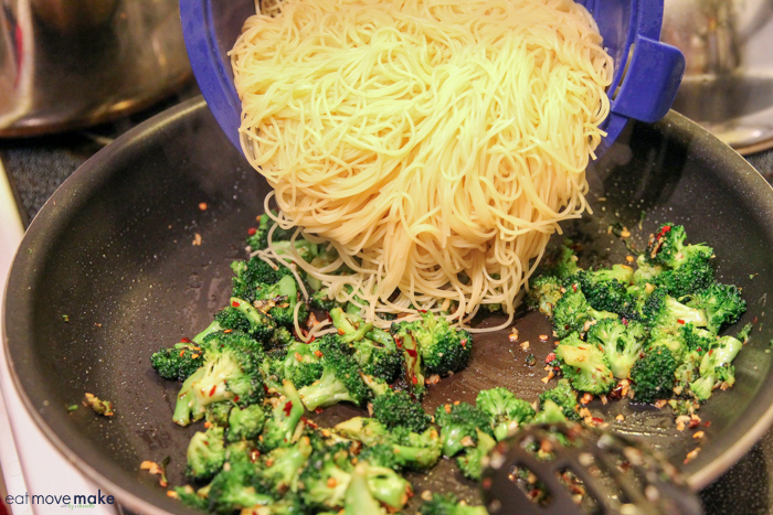 add pasta to broccoli in pan