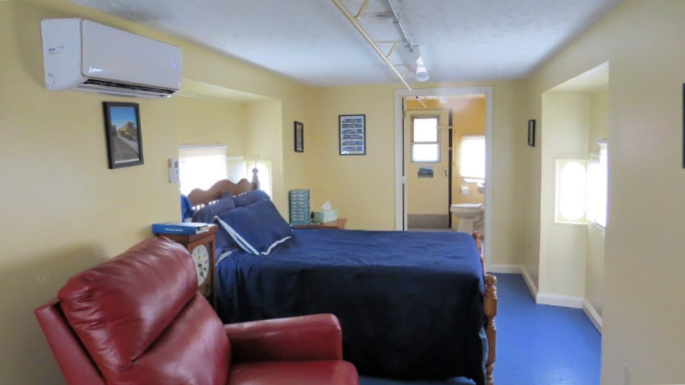 inside blue caboose B&B Dolittle Station