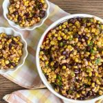 corn and black bean salad in serving bowl and small bowls