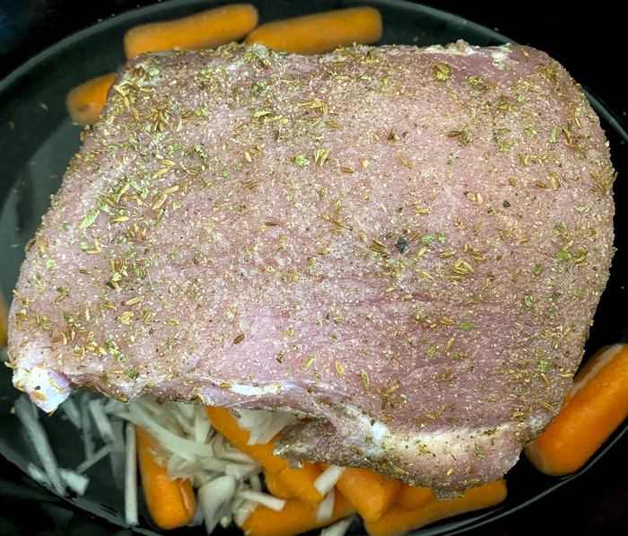 pork loin cooking in slow cooker