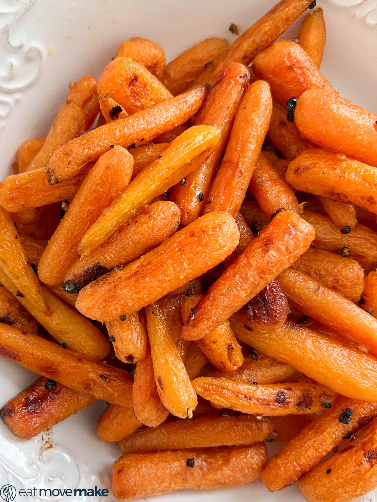 bowl of roasted baby carrots with honey