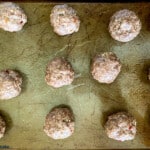 meatballs on baking sheet.