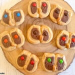 hoot owl cookies on wooden platter.