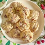 cranberry and rosemary shortbread cookies on plate.