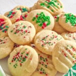 whipped shortbread cookies on white plate.