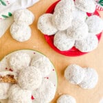 Pfeffernusse cookies on plates.